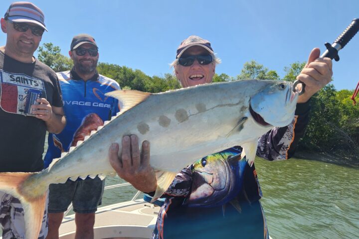a person holding a fish