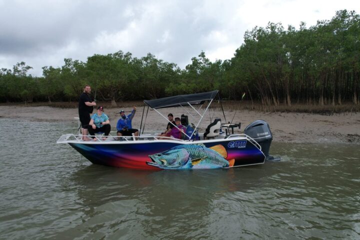 a small boat in a body of water