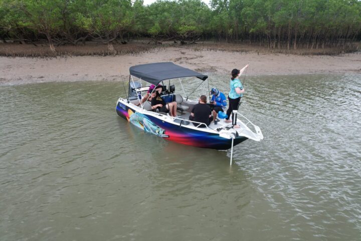 a small boat in a body of water