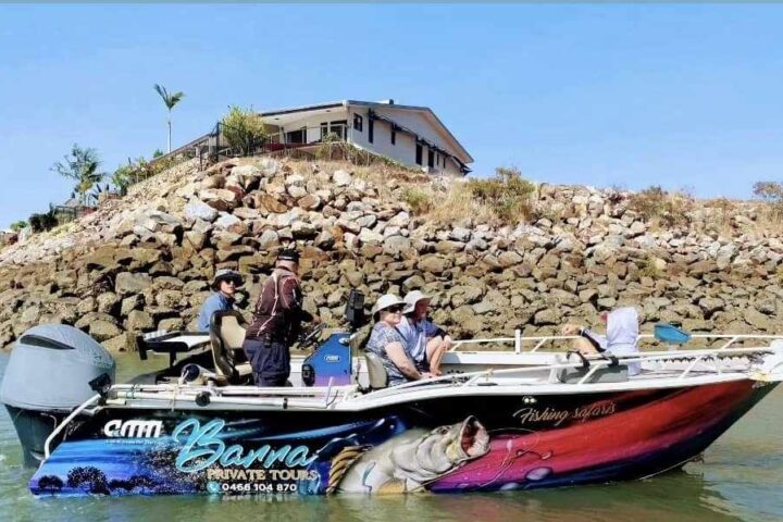 a group of people on a boat in the water